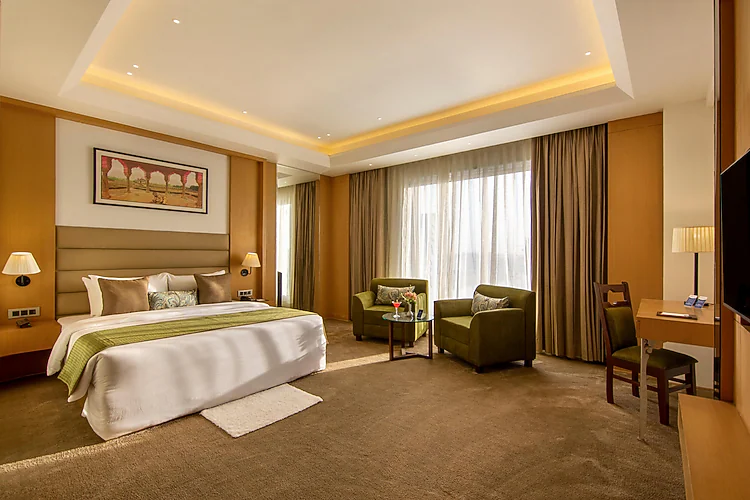 Suite AC Room at Pathaleshwara Sadan with 2 beds and amenities